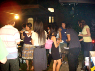 Participants enjoying the BBQ party at night