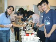 Participants enjoying takoyaki cooking