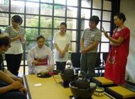 Participants learning how to make tea