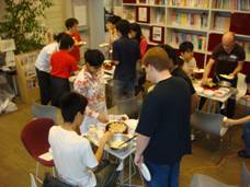 Participants cook takoyaki