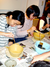 Participants decorating their handiworks