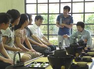 Participants learning how to eat Japanese confectionery