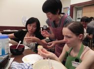 Participants decorating their　Japanese sweet ‘ajisai (hydrangea‘) 