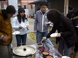 Participants choosing a toping for their mochi